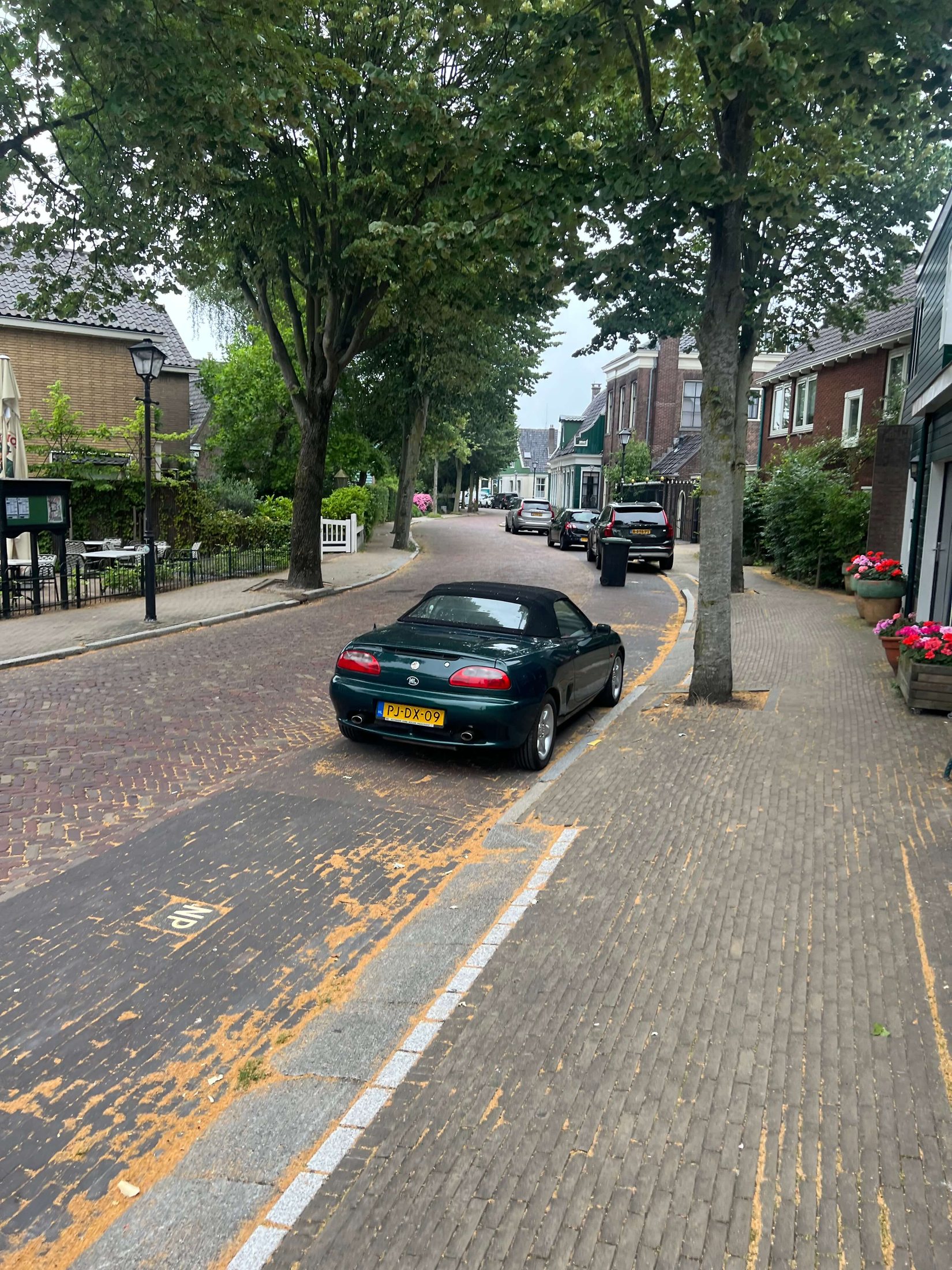 Lagedijk Street in Zaandijk Brick-paved Lagedijk street with traditional houses in Zaandijk