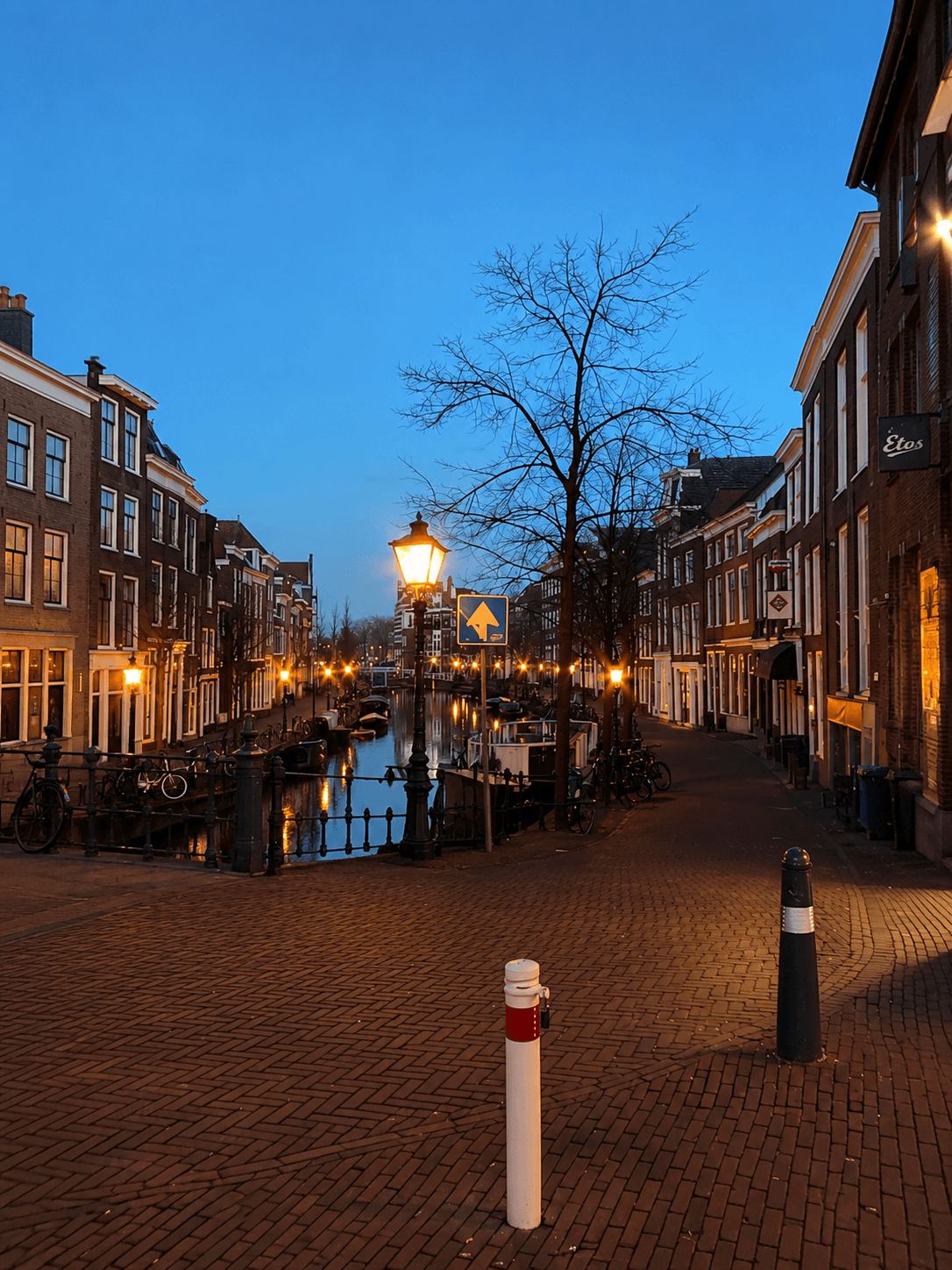A Leiden Canal Street at Blue Hour Leiden canal street lit by lamplight at dusk with reflections in the water