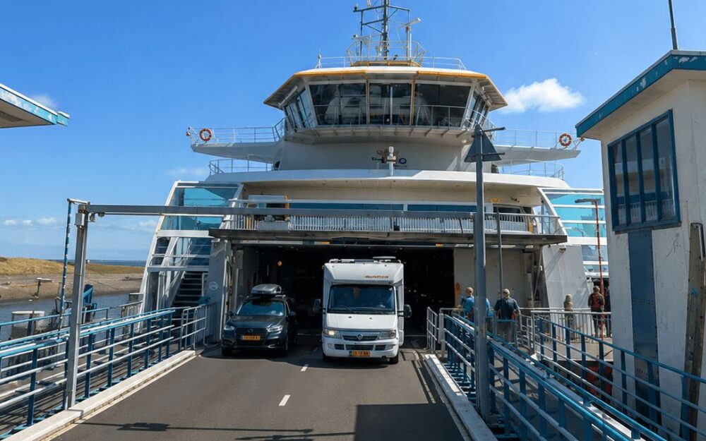 Cars and a campervan boarding the TESO ferry to Texel at the terminal