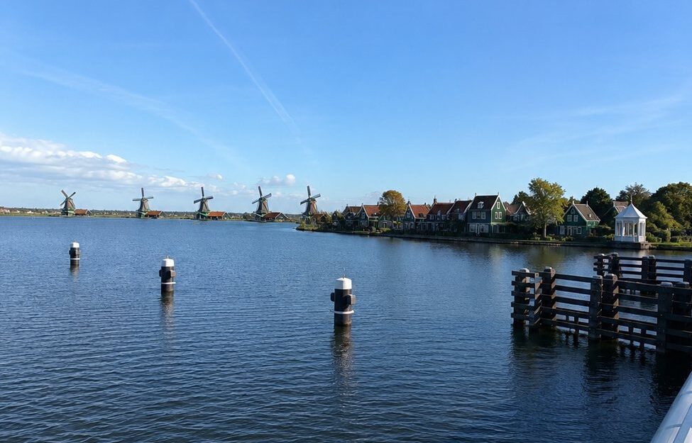 Panoramic view of the Zaan river and windmills from the Julianabrug bridge in Zaanse Schans